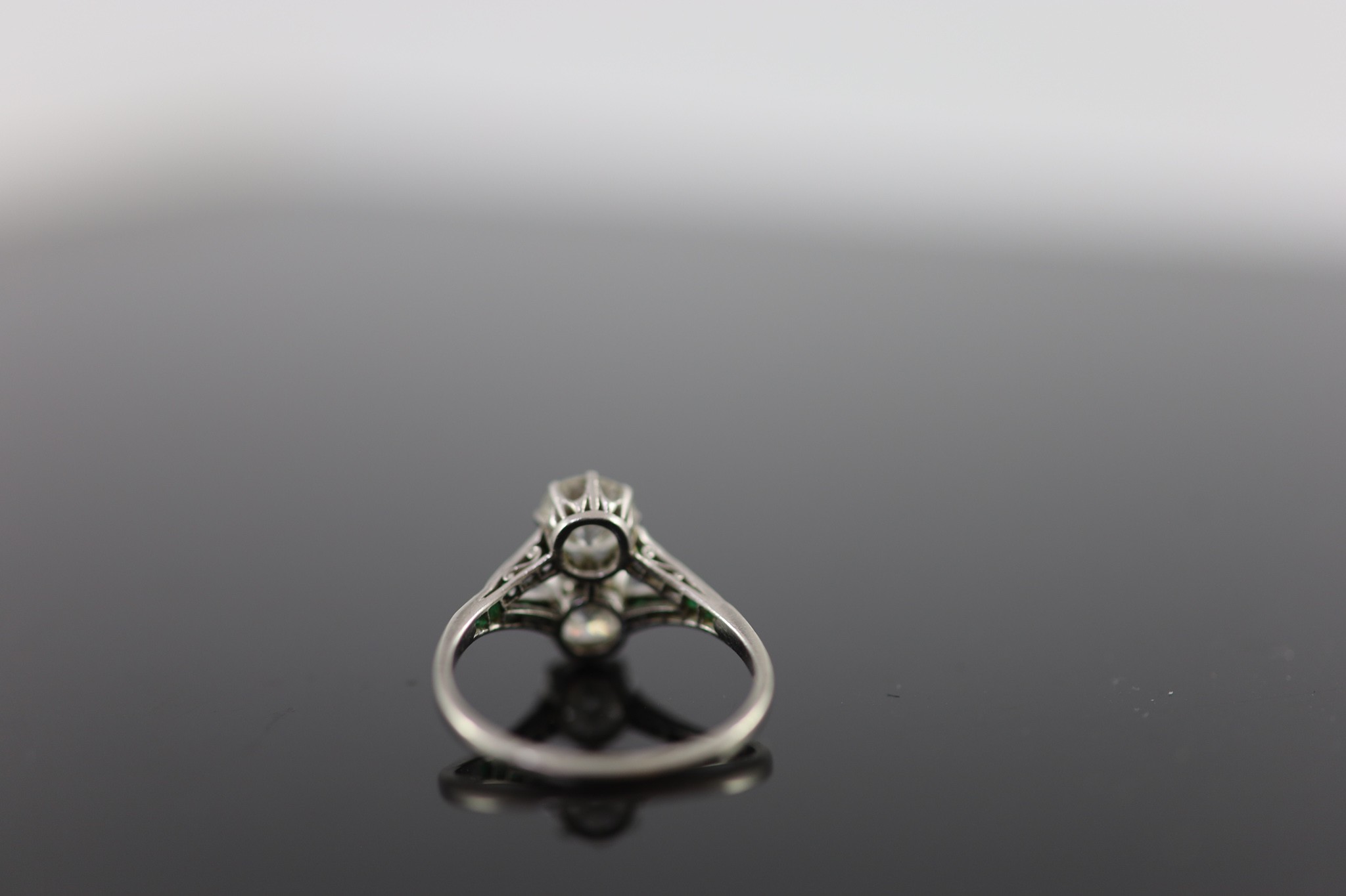 A 1920's platinum and two stone diamond ring